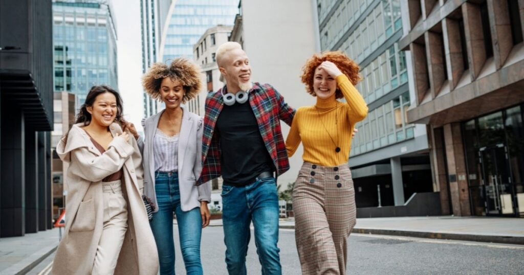 4 millennials on downtown street