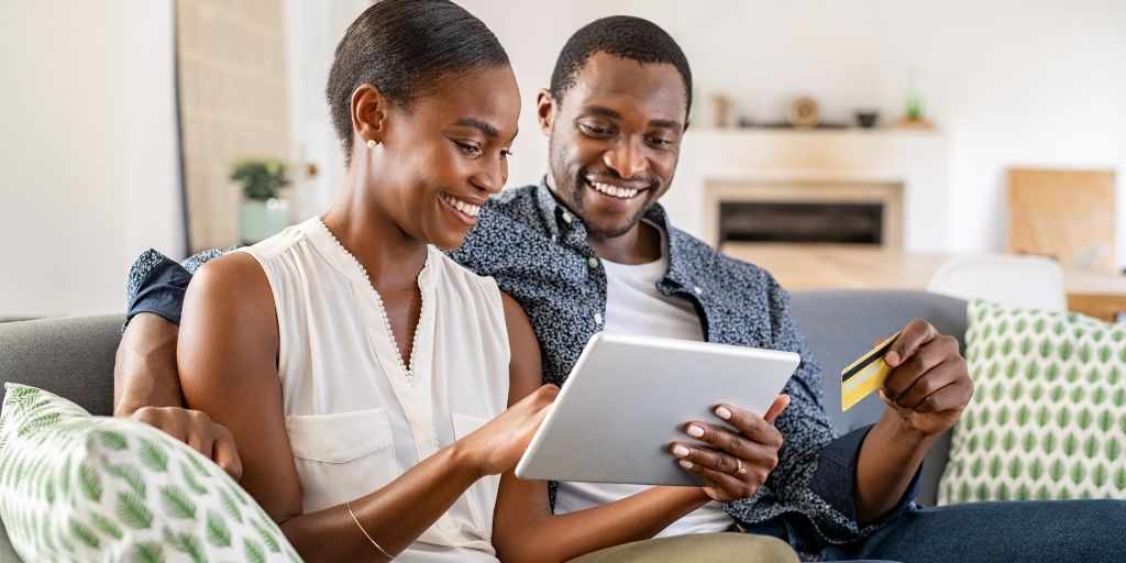 african american couple with credit card