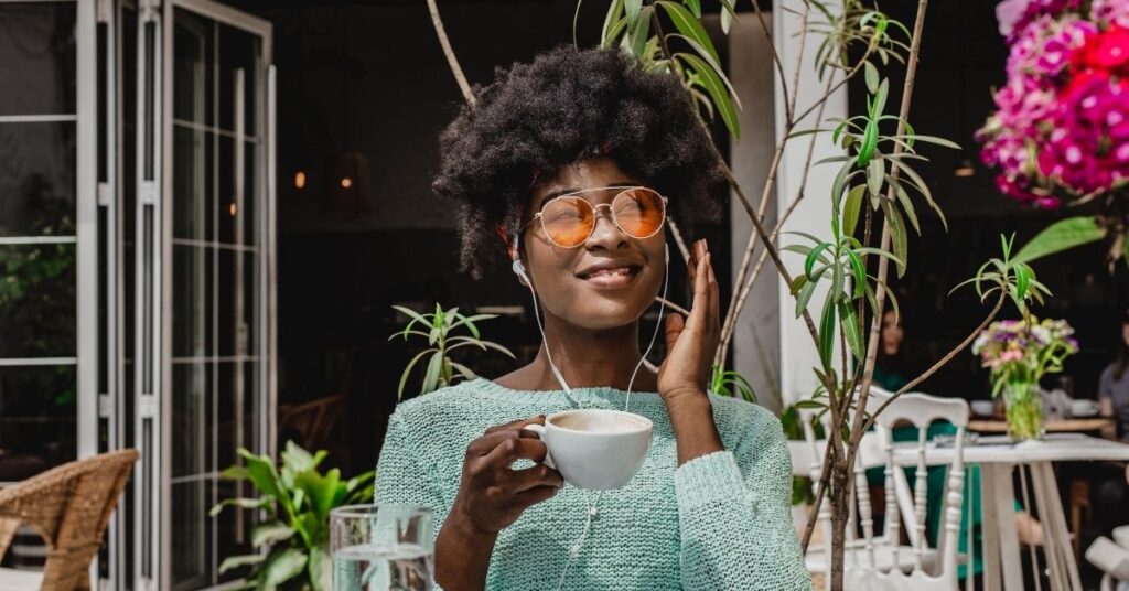 black woman wearing earphones