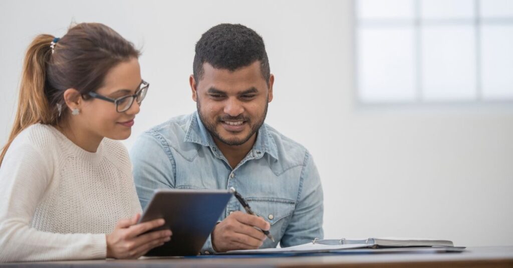 man and women studying together