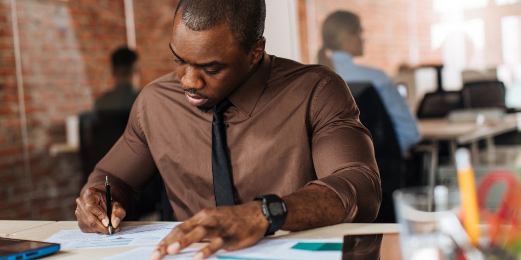 professional african american male working in office setting